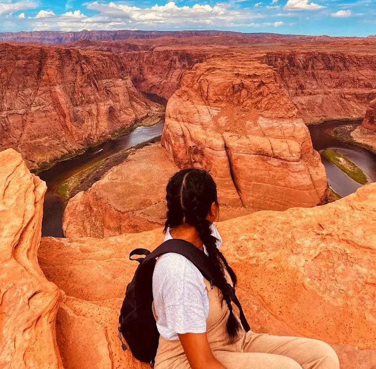 Lady With Backpack overlooking Horseshoe Bend